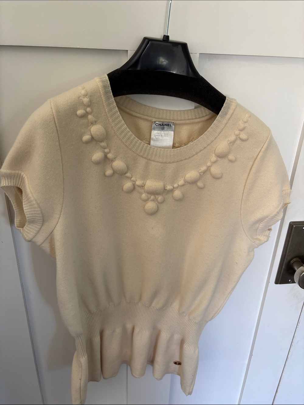 CHANEL Cream Peplum knit top